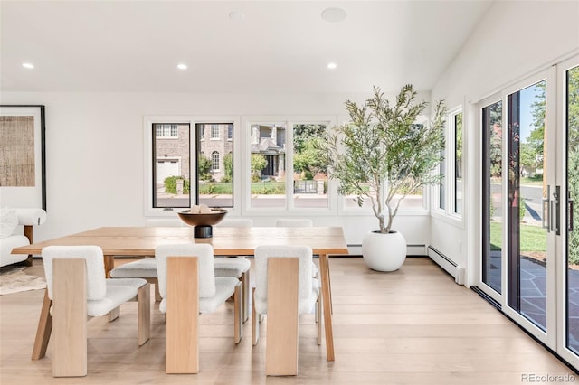 sunroom featuring vaulted ceiling