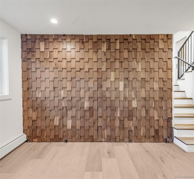 details with a baseboard radiator, wood finished floors, and recessed lighting