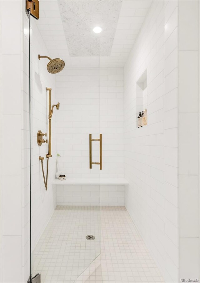 bathroom with a stall shower