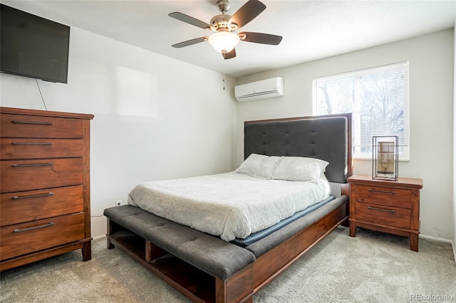 bedroom featuring baseboards, light colored carpet, a ceiling fan, and a wall unit AC