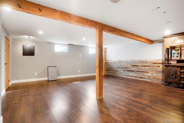 below grade area with recessed lighting, baseboards, and wood finished floors