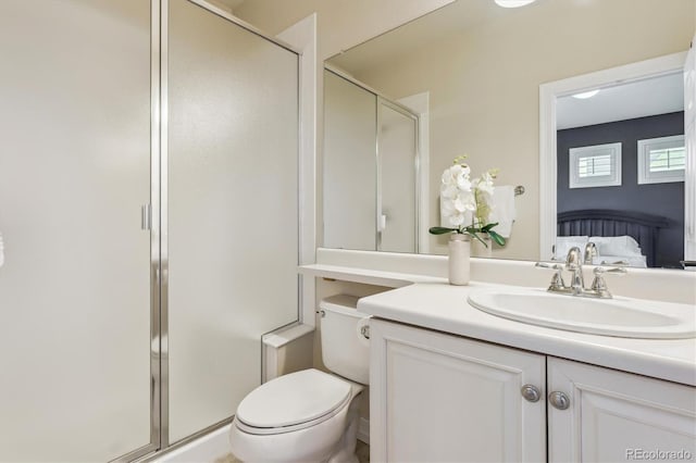 6927 Winter Ridge Pl, Castle Pines, CO 80108 - bathroom with vanity, a shower stall, and toilet