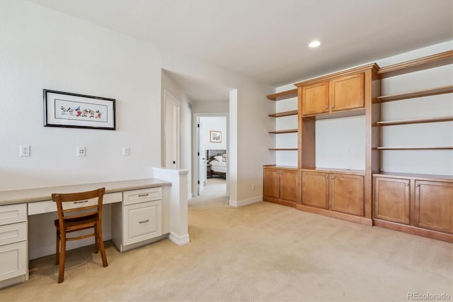 6927 Winter Ridge Pl, Castle Pines, CO 80108 - unfurnished office featuring baseboards, built in desk, recessed lighting, and light colored carpet