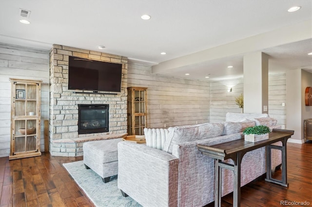 6927 Winter Ridge Pl, Castle Pines, CO 80108 - living room with wood-type flooring, wood walls, and visible vents