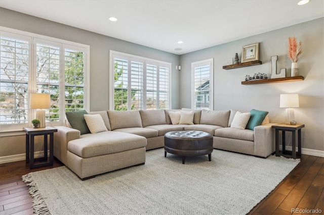 6927 Winter Ridge Pl, Castle Pines, CO 80108 - living area featuring recessed lighting, wood-type flooring, a wealth of natural light, and baseboards