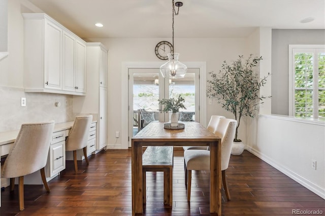6927 Winter Ridge Pl, Castle Pines, CO 80108 - dining room with a chandelier, dark wood finished floors, baseboards, and recessed lighting