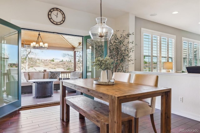 6927 Winter Ridge Pl, Castle Pines, CO 80108 - dining room with recessed lighting, wood finished floors, baseboards, and a notable chandelier