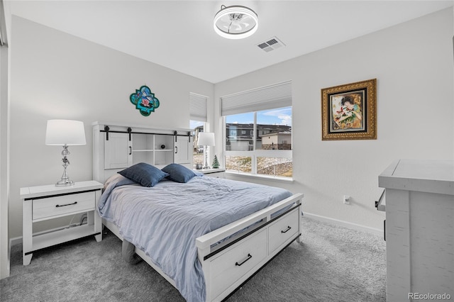 bedroom with dark colored carpet