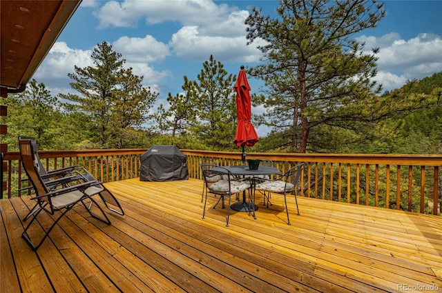 310 Wendelyn Way, Boulder, CO 80302 - wooden terrace featuring outdoor dining space and a grill