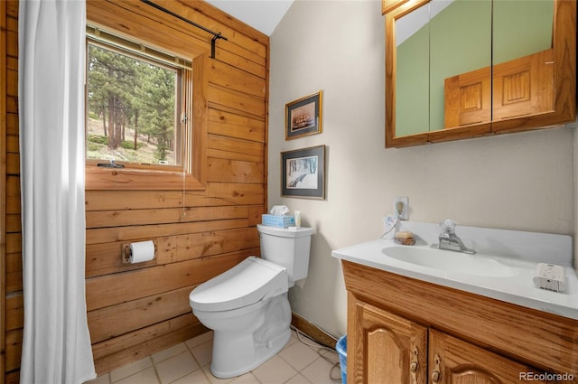 310 Wendelyn Way, Boulder, CO 80302 - bathroom featuring wood walls, toilet, vanity, and tile patterned flooring