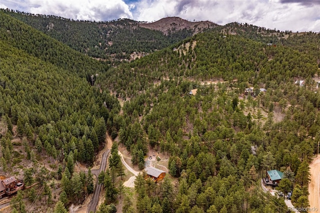 310 Wendelyn Way, Boulder, CO 80302 - aerial overview of property's location with a heavily wooded area and mountains