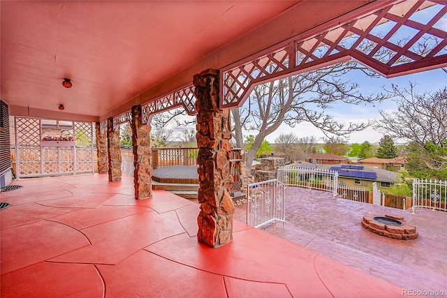 view of patio with an outdoor fire pit and a fenced backyard