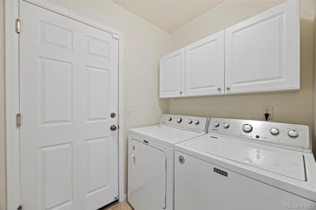 laundry area featuring cabinet space and independent washer and dryer