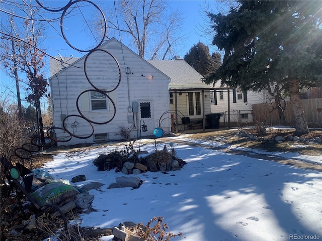 view of snow covered property