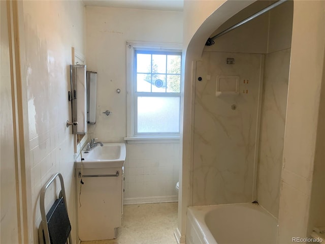 full bathroom with vanity, shower / bathing tub combination, heating unit, and toilet