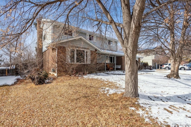 view of front of home with brick siding