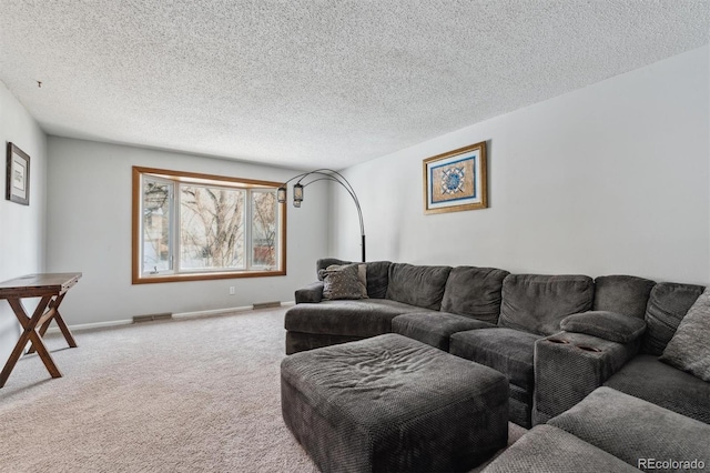 living area featuring carpet, visible vents, a textured ceiling, and baseboards