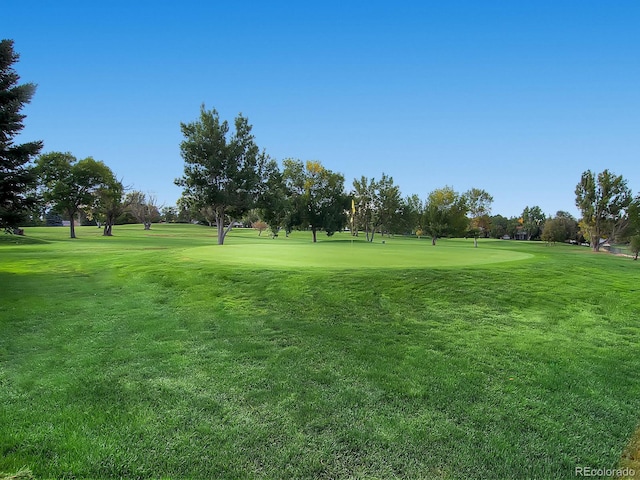 2301 E Fremont Ave Unit W03, Centennial, CO 80122 - view of community featuring a yard and golf course view