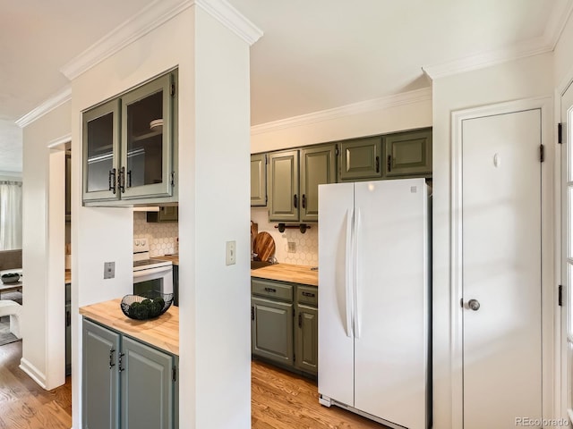 2301 E Fremont Ave Unit W03, Centennial, CO 80122 - kitchen with white appliances, butcher block countertops, light wood-type flooring, crown molding, and backsplash