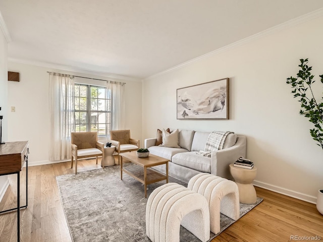 2301 E Fremont Ave Unit W03, Centennial, CO 80122 - living room with light wood-style floors, ornamental molding, and baseboards