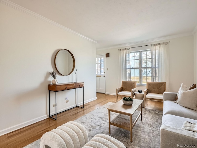 2301 E Fremont Ave Unit W03, Centennial, CO 80122 - living room with ornamental molding, wood finished floors, and baseboards