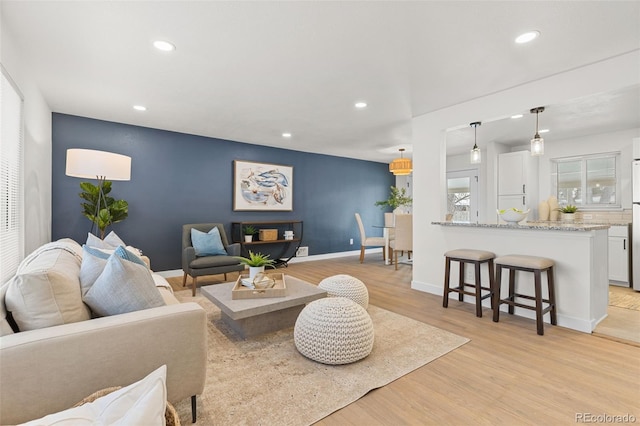 living room with light wood-type flooring