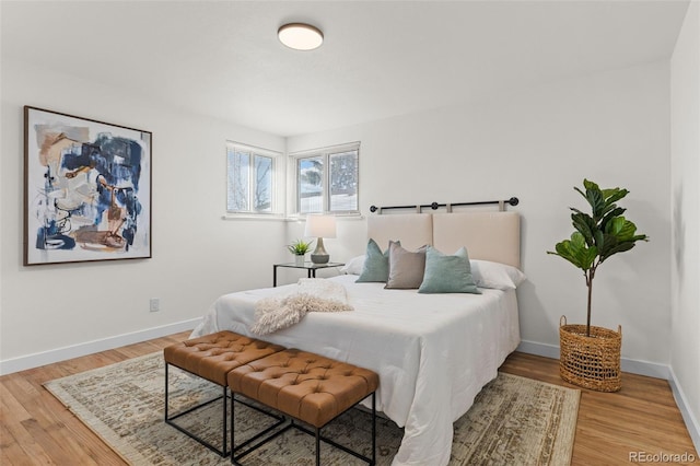 bedroom with light hardwood / wood-style flooring