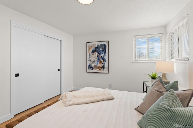 bedroom with light hardwood / wood-style flooring