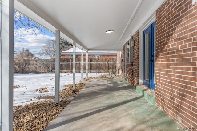 view of snow covered patio