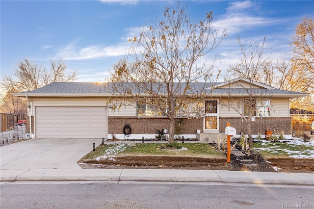 ranch-style home with a garage