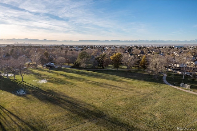 birds eye view of property with a mountain view