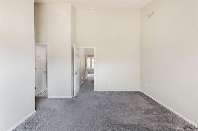 3098 W 107th Pl Unit C, Westminster, CO 80031 - carpeted spare room with baseboards and a high ceiling