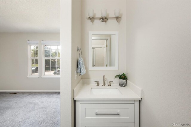 3098 W 107th Pl Unit C, Westminster, CO 80031 - bathroom with vanity and baseboards