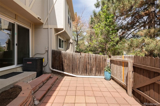3098 W 107th Pl Unit C, Westminster, CO 80031 - view of patio / terrace featuring fence and cooling unit