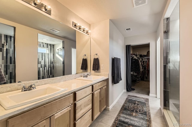 bathroom featuring vanity and tile patterned floors