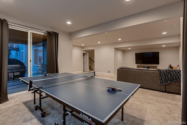 game room with light colored carpet