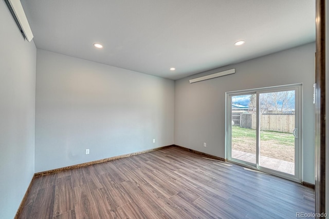 806 S St, Silver Cliff, CO 81252 - spare room with wood finished floors, baseboards, and recessed lighting