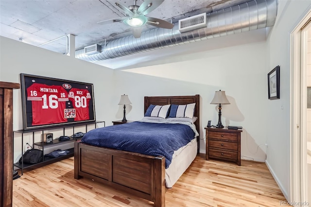 bedroom with wood-type flooring and ceiling fan