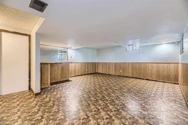 661 S Paris St, Aurora, CO 80012 - finished basement featuring a wainscoted wall and wooden walls