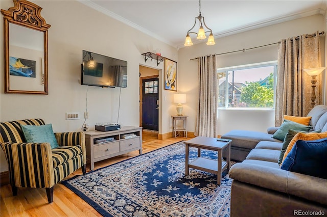 433 Fox St, Denver, CO 80204 - living room with light wood-style flooring, ornamental molding, healthy amount of natural light, and baseboards