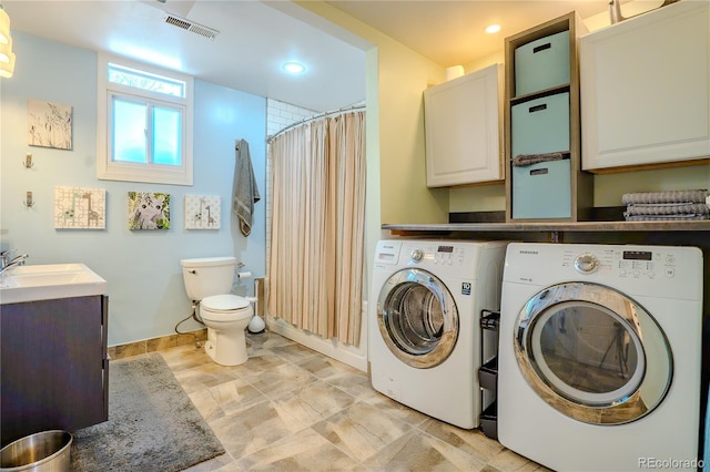 433 Fox St, Denver, CO 80204 - laundry area with washing machine and clothes dryer, baseboards, and recessed lighting