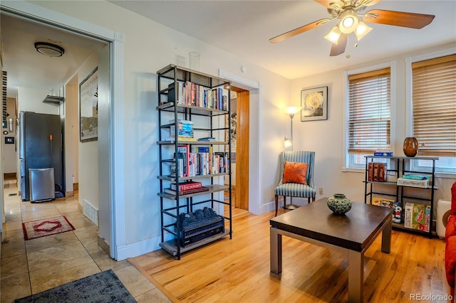 433 Fox St, Denver, CO 80204 - sitting room with ceiling fan, baseboards, and light tile patterned flooring