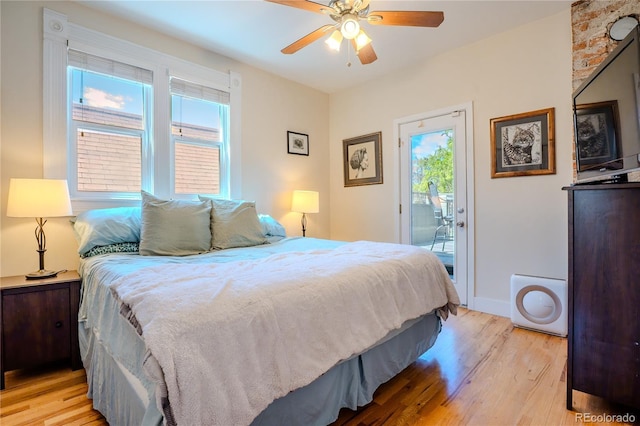 433 Fox St, Denver, CO 80204 - bedroom featuring light wood-style flooring, access to outside, baseboards, and ceiling fan