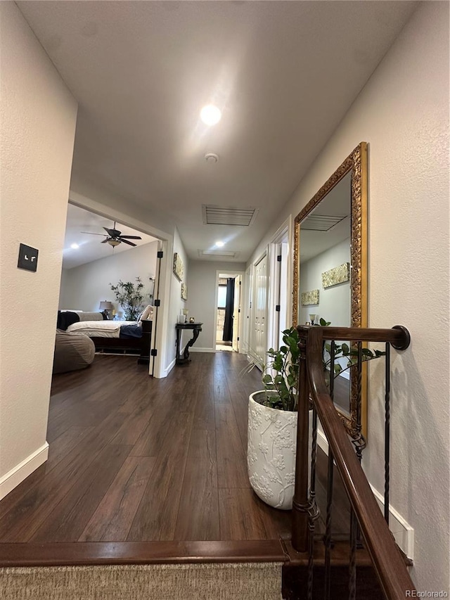7844 W Friend Dr, Littleton, CO 80128 - hallway featuring wood finished floors and baseboards