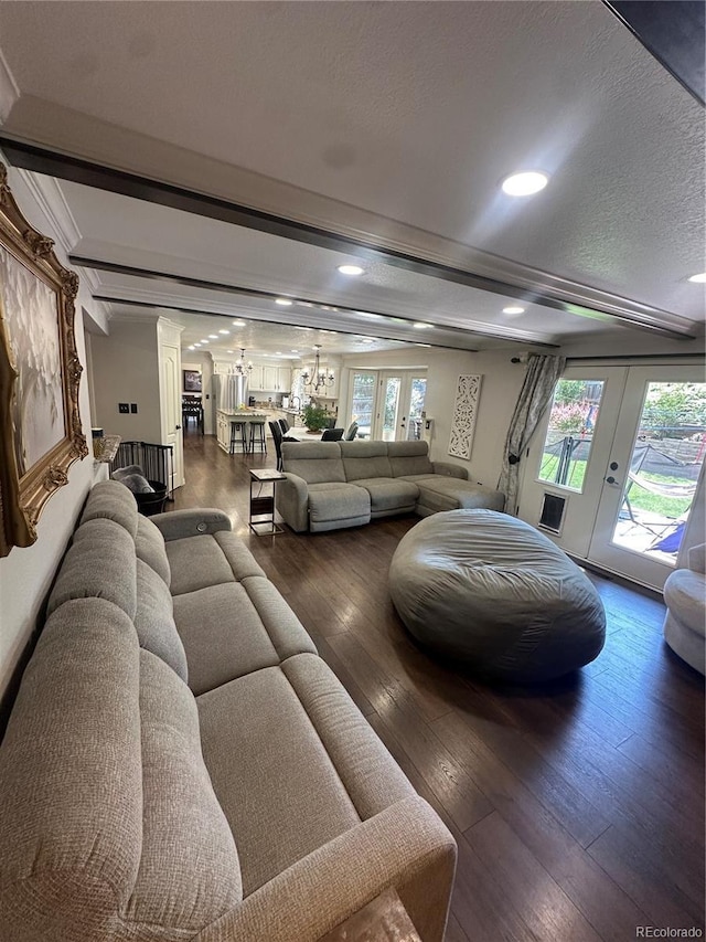 7844 W Friend Dr, Littleton, CO 80128 - living room with french doors, hardwood / wood-style flooring, beam ceiling, recessed lighting, and a chandelier