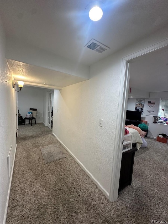 7844 W Friend Dr, Littleton, CO 80128 - corridor with carpet flooring and a textured wall