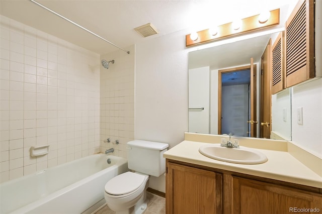 1301 S Cathay Ct Unit 104, Aurora, CO 80017 - bathroom featuring toilet, vanity, and shower / bath combination