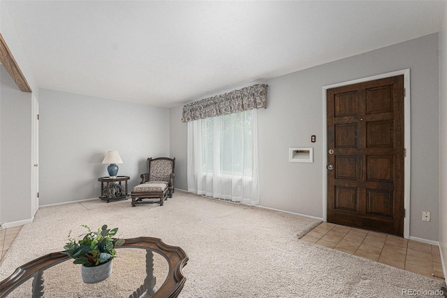 7644 Wyandot St, Denver, CO 80221 - entrance foyer featuring carpet floors and tile patterned flooring
