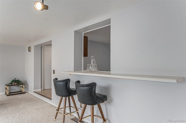 7644 Wyandot St, Denver, CO 80221 - bar with carpet flooring and baseboards