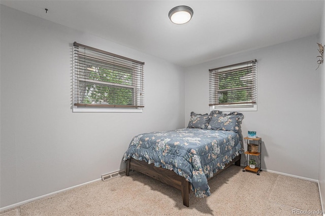 7644 Wyandot St, Denver, CO 80221 - bedroom featuring multiple windows and carpet